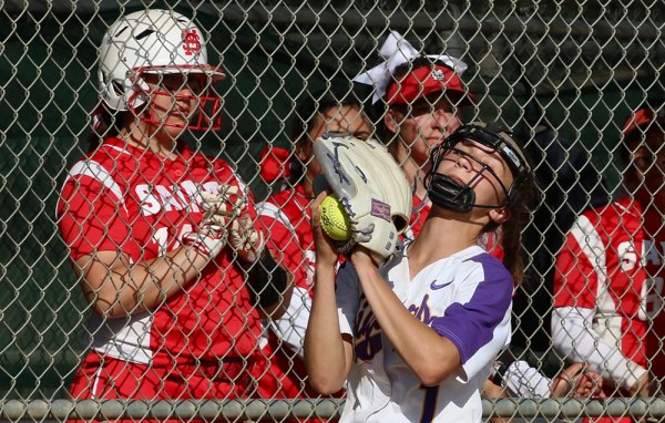Lemoore's Kyleigh Allen makes a catch in the third inning of the Tigers 10-2 playoff win Tuesday against visiting Santa Maria High School.